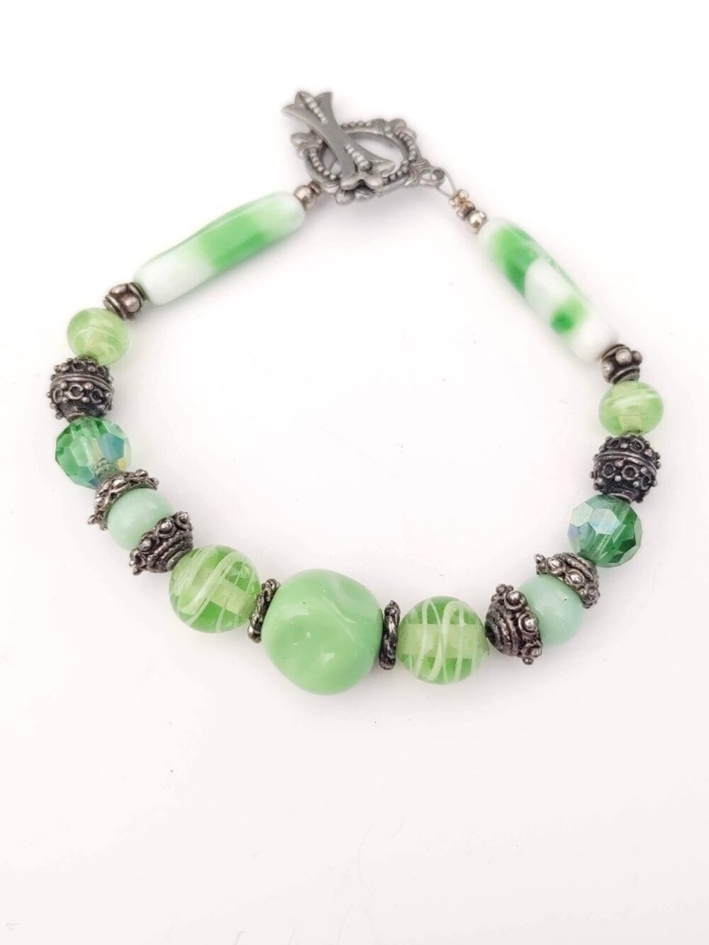 Green glass and antique silver beaded bracelet